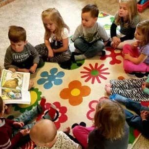 Children looking at their Schoolastic Reading Club book order